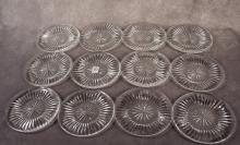 TWELVE WATERFORD BREAD AND BUTTER PLATES
