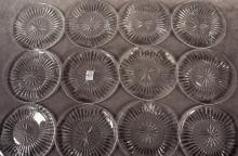 TWELVE WATERFORD BREAD AND BUTTER PLATES