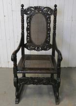 CARVED OAK ARMCHAIR