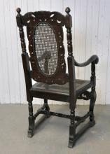 CARVED OAK ARMCHAIR
