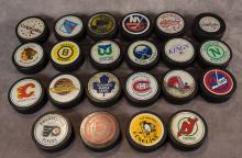 VINTAGE HOCKEY PUCKS