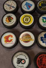 VINTAGE HOCKEY PUCKS