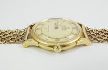 GOLD OMEGA WRISTWATCH