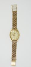 GOLD OMEGA WRISTWATCH