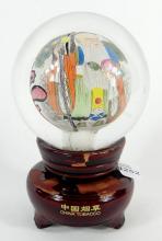 REVERSE PAINTED CRYSTAL BALL