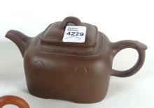 THREE TERRA COTTA TEAPOTS