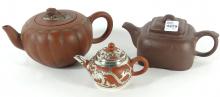 THREE TERRA COTTA TEAPOTS