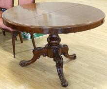 CIRCULAR MAHOGANY DINING TABLE