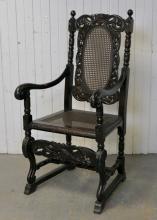 CARVED OAK ARMCHAIR