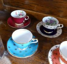 SEVEN AYNSLEY CUPS AND SAUCERS