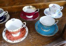 SEVEN AYNSLEY CUPS AND SAUCERS