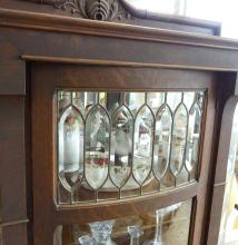 BOW-SIDED CHINA CABINET