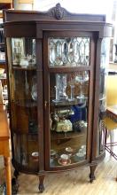 BOW-SIDED CHINA CABINET