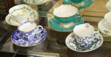 SEVEN ENGLISH CUPS AND SAUCERS