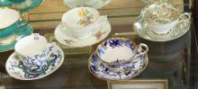 SEVEN ENGLISH CUPS AND SAUCERS