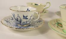 FOUR ENGLISH CUPS AND SAUCERS