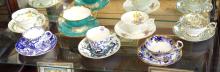 SEVEN ENGLISH CUPS AND SAUCERS