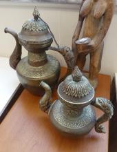 TWO TEAPOTS AND CARVING