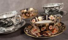 ROYAL CROWN DERBY CUPS AND SAUCERS