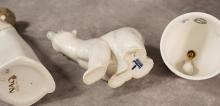 TWO SPANISH FIGURINES AND BELL