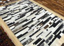 BLACK AND WHITE COWHIDE RUG