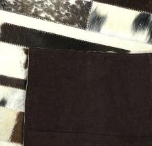 BLACK AND WHITE COWHIDE RUG