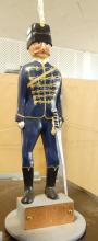 THREE FOLK ART WOODEN "SOLDIER" CARVINGS