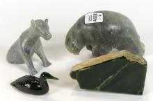 FOUR INUIT STONE CARVINGS