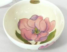 TWO PIECES OF MOORCROFT "MAGNOLIA" POTTERY