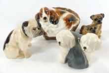 4 DOG FIGURINES