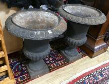 PAIR OF CAST IRON URNS