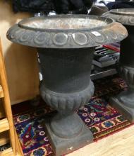 PAIR OF CAST IRON URNS