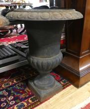 PAIR OF CAST IRON URNS