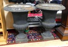 PAIR OF CAST IRON URNS