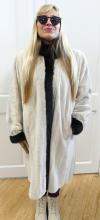 BLACK AND WHITE MINK COAT