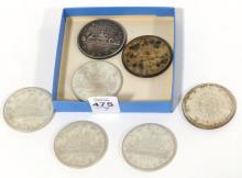 SEVEN CANADIAN SILVER DOLLARS