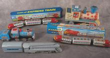 5 TIN TOY TRAINS