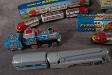 5 TIN TOY TRAINS