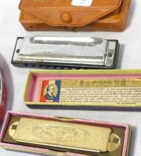 SEVEN VINTAGE HARMONICAS