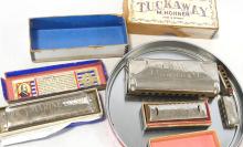 SEVEN VINTAGE HARMONICAS