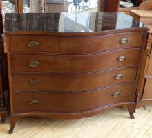 SERPENTINE CHEST OF DRAWERS