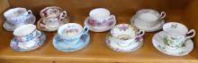 EIGHT CUPS AND SAUCERS