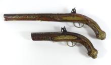 TWO FLINTLOCK PISTOLS & POWDER FLASK