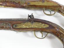 TWO FLINTLOCK PISTOLS & POWDER FLASK