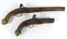 TWO FLINTLOCK PISTOLS & POWDER FLASK