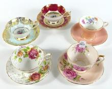 FIVE CUPS AND SAUCERS