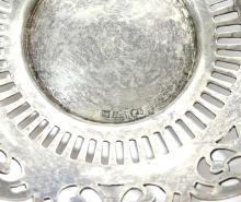 FOUR PIECES OF STERLING SILVER