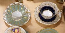 SIX AYNSLEY CUPS AND SAUCERS