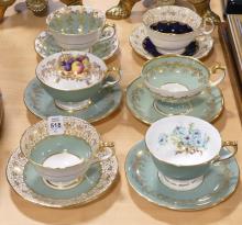 SIX AYNSLEY CUPS AND SAUCERS