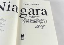 TWO SIGNED CANADIAN HARDCOVER VOLUMES